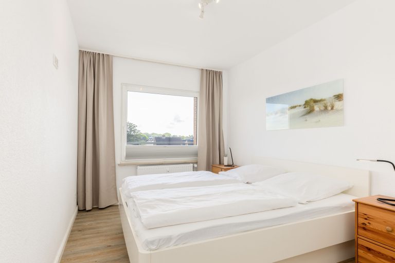 Schlafzimmer einer Ferienwohnung auf Sylt